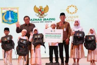 Pemprov DKI Jakarta bersama Baznas DKI menggelar Santunan Muharam dan Belanja Bersama bagi anak yatim. (Dok. Pemprov DKI)