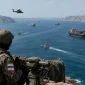 Ilustrasi militer Iran mengawasi Selat Hormuz. (AI)